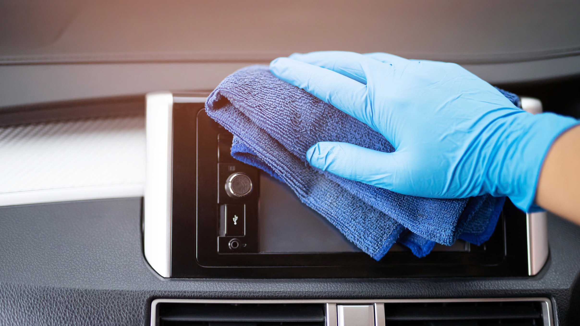 Hand Cleaning the Interior of a Car